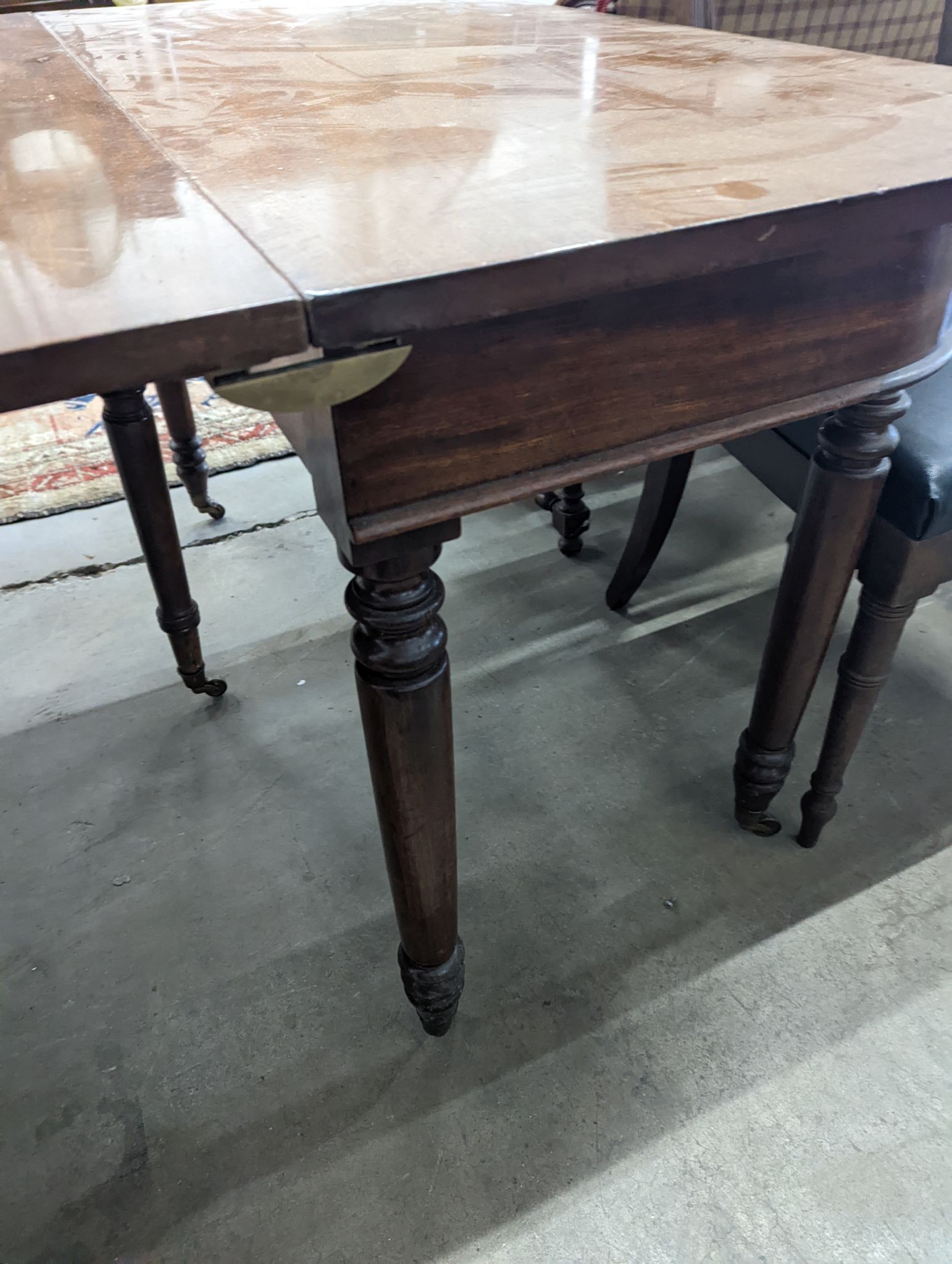 A George IV mahogany D end drop leaf extending dining table, 266cm extended, width 121cm, height 74cm